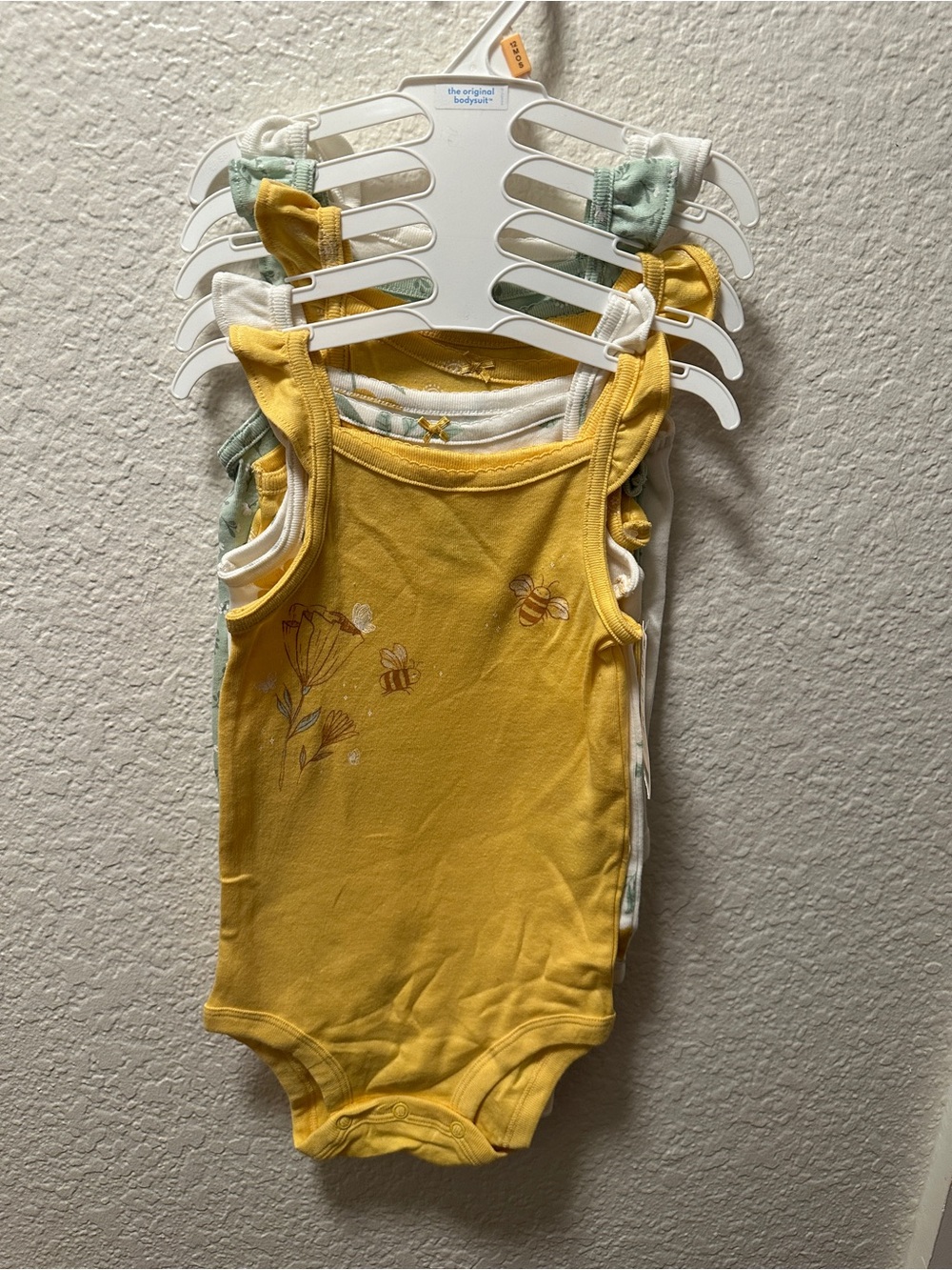 Brand new set of baby onesies